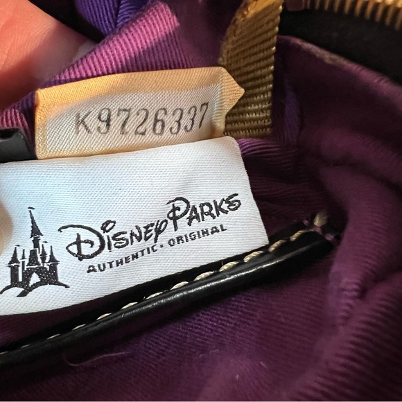 Dooney & Bourke Disney Park
Haunted Mansion 50th
Anniversary Bag Crossbody Purse - Picture 8 of 16